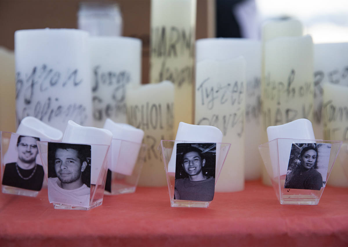Photos of people killed by police violence at a Día de los Muertos event to honor them at ...