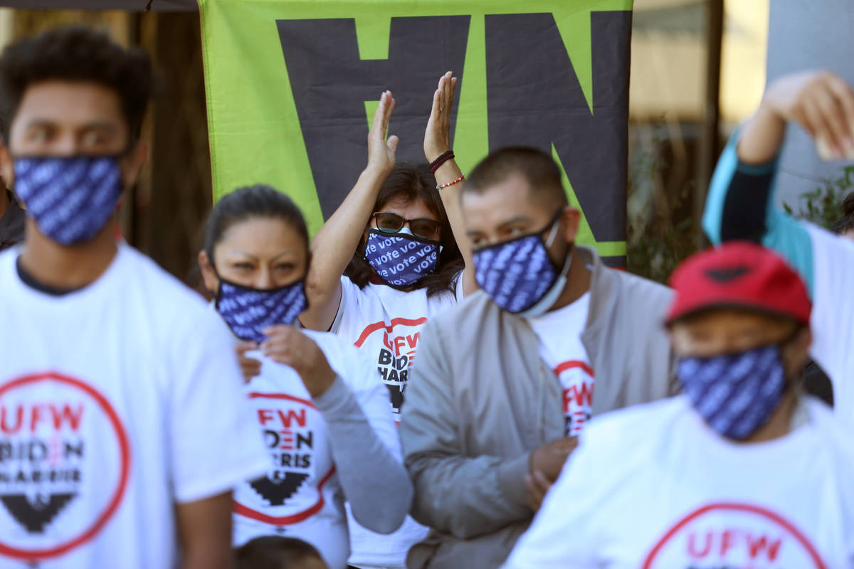 People participate during an Election Day kickoff event at a DemocratsՠVoter Activation C ...