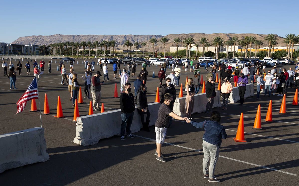 The line outside the voting site at Las Vegas Ballpark has a wait time of about 40 minutes arou ...