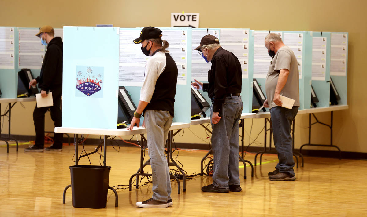 People vote at Historic Fifth Street School in downtown Las Vegas on Election Day Tuesday, Nov. ...