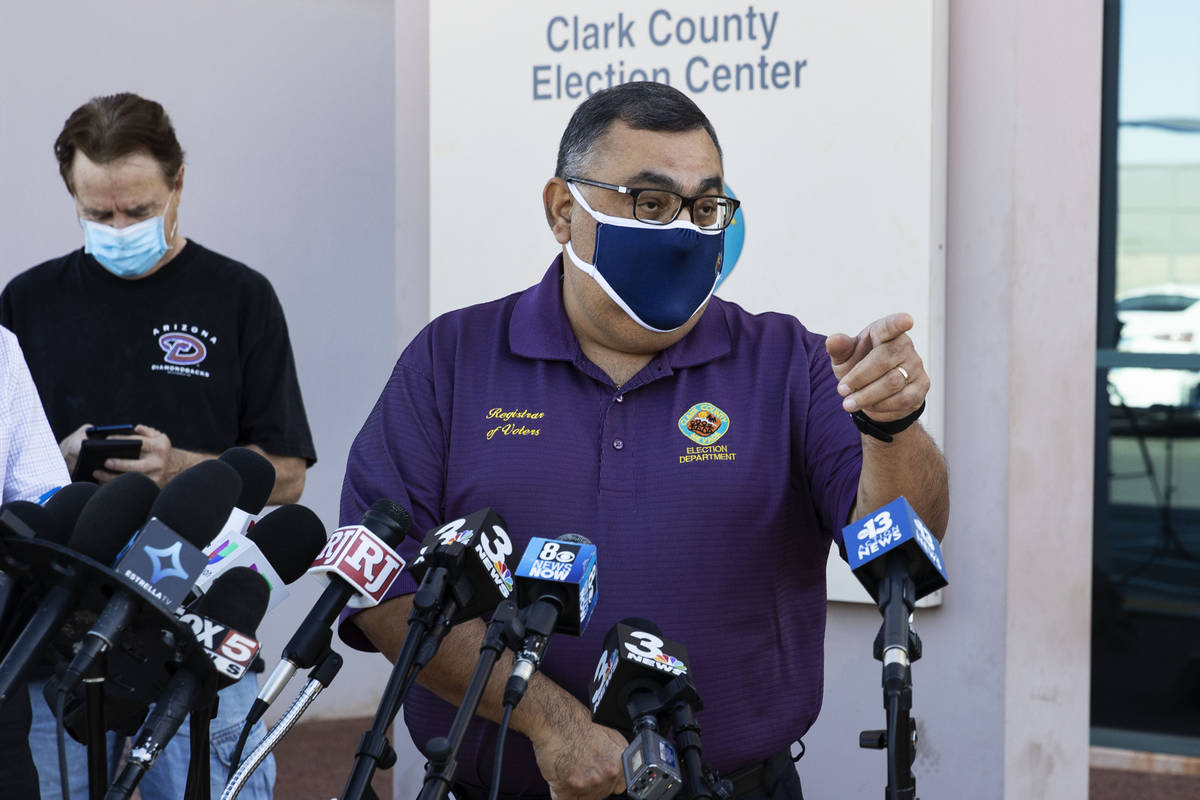 Clark County Registrar, Joe Gloria, provides a brief update to the media outside of the Electio ...