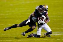 New Orleans Saints safety C.J Gardner-Johnson (22) tackles Chicago Bears wide receiver Anthony ...