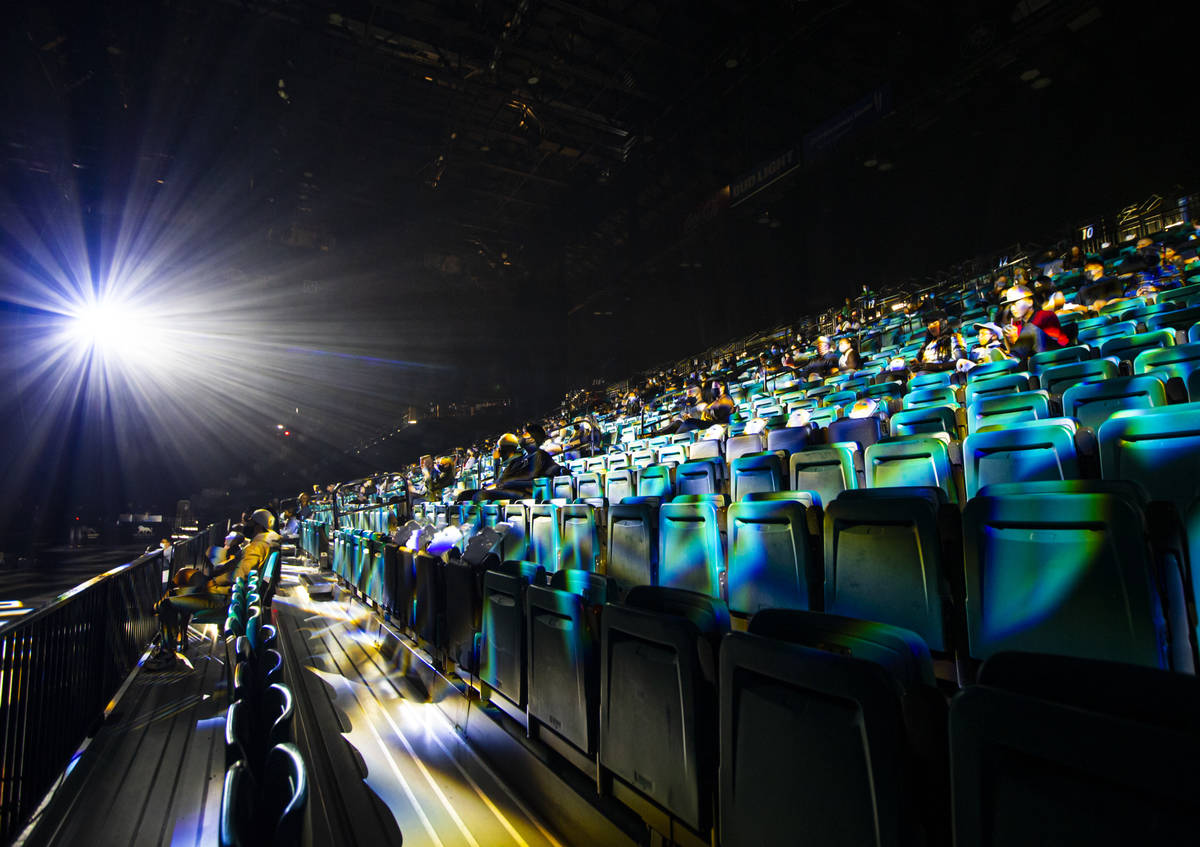 People sit socially distanced at the start of the Jabbawockeez' new production, "Timeless, ...