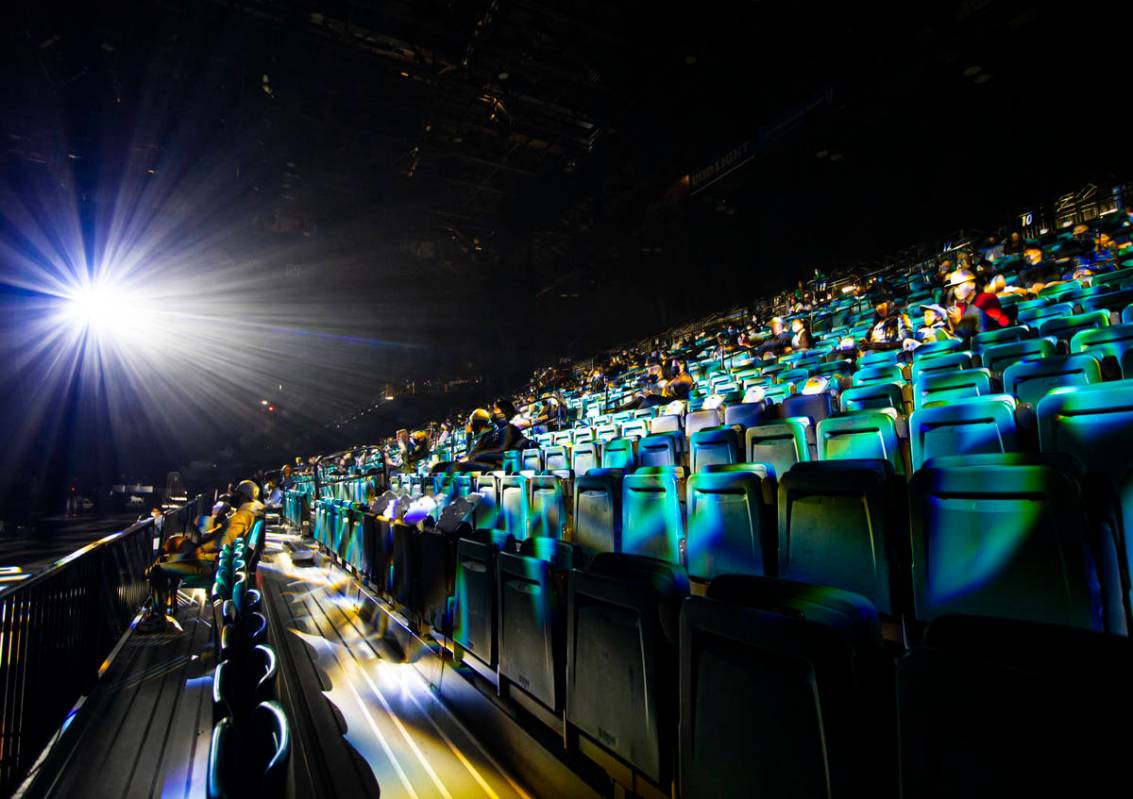 People sit socially distanced at the start of the Jabbawockeez' new production, "Timeless, ...