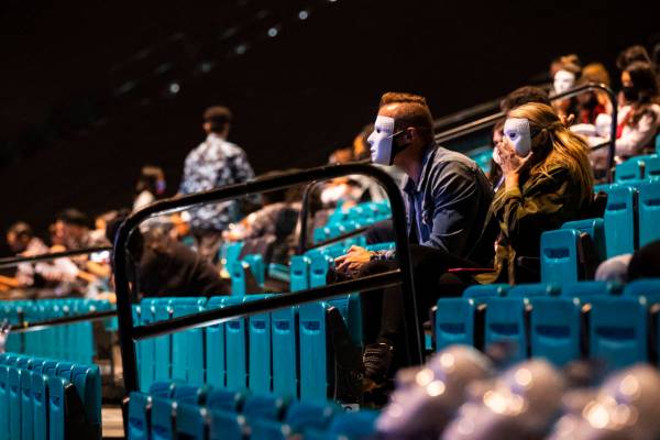 People pose in their Jabbawockeez masks before the beginning of the group's new production, &qu ...