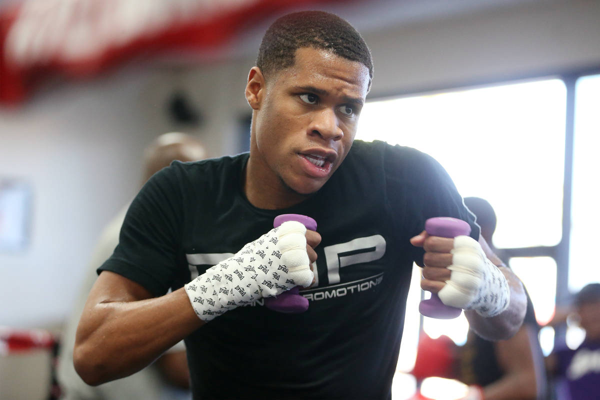Boxer Devin Haney warms up during a boxing gym workout at Title Boxing gym in Las Vegas, T ...