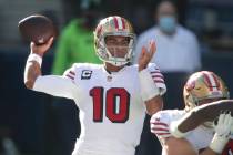 San Francisco 49ers quarterback Jimmy Garoppolo passes against the Seattle Seahawks during the ...