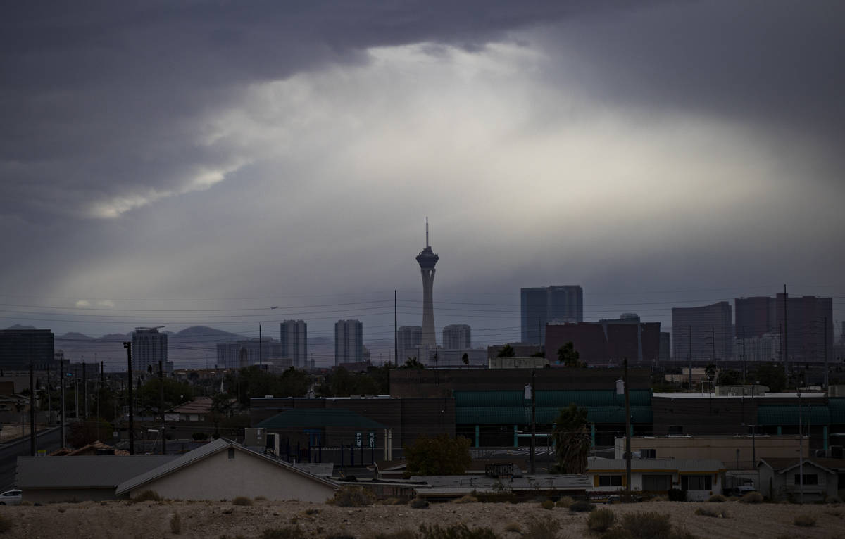 A view of the northern end of the Las Vegas Strip as rain falls in the Las Vegas Valley on Satu ...
