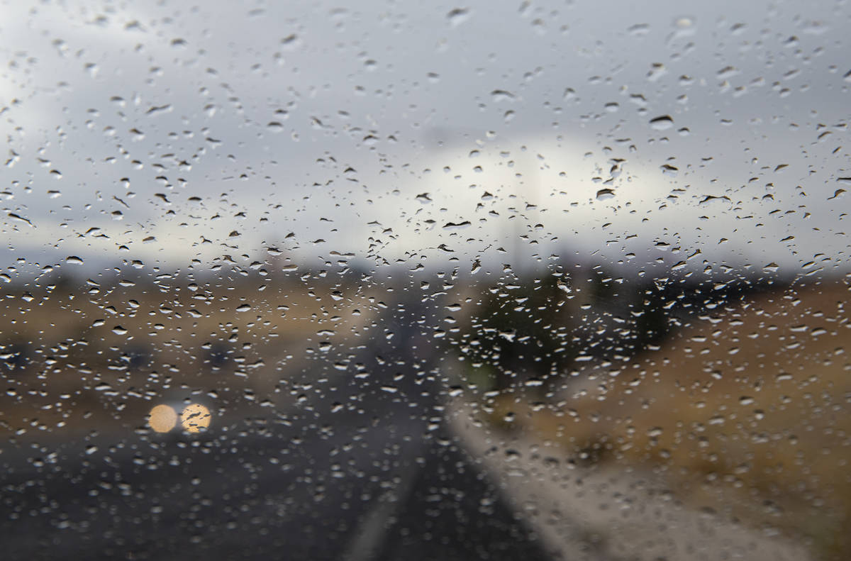 Droplets gather on a windshielf as rain falls in the Las Vegas Valley on Saturday, Nov. 7, 2020 ...