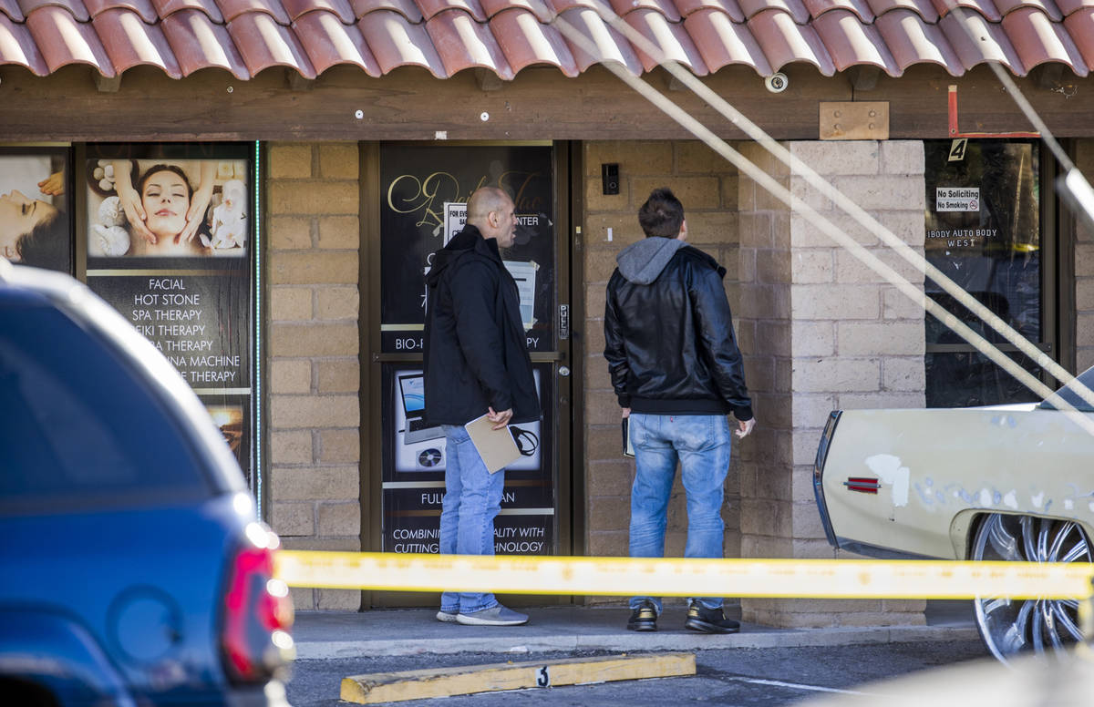 Las Vegas police look to camera positions as they investigate a homicide in the central valley ...