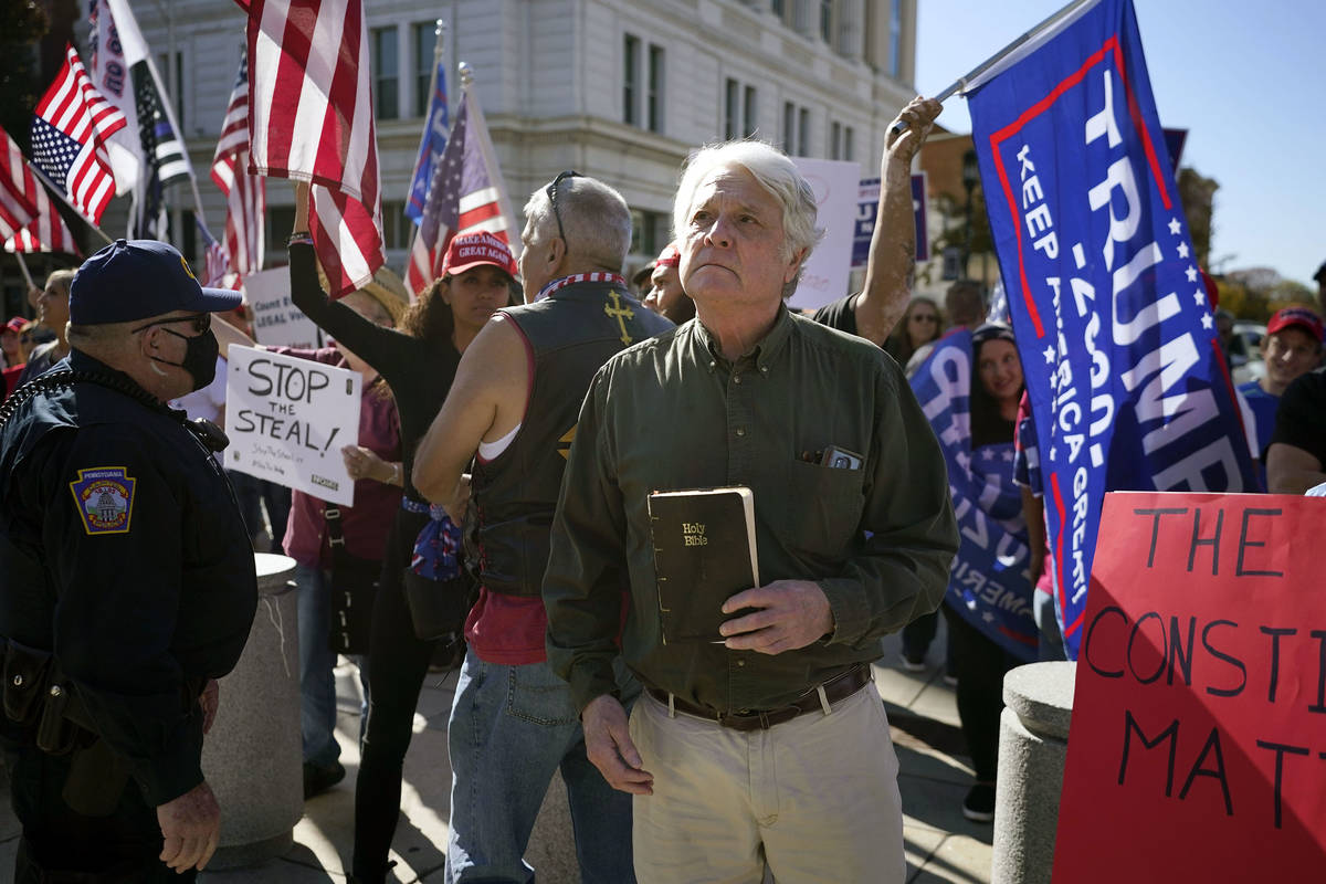 Supporters of President Donald Trump demonstrate outside the Pennsylvania State Capitol, Saturd ...