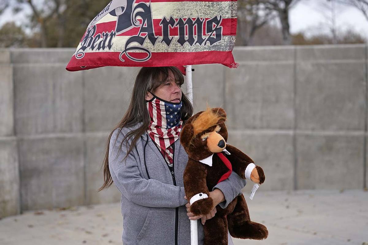 Supporters of President Donald Trump stage a rally outside the Utah State Capitol Saturday, Nov ...
