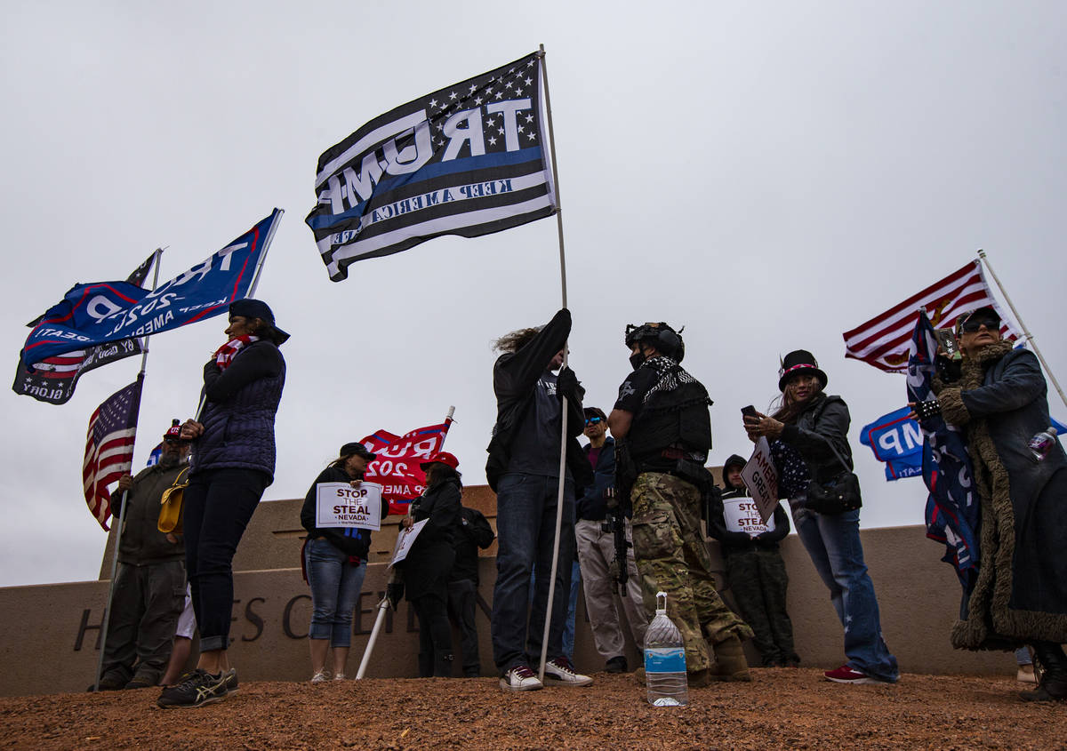 Supporters of President Donald Trump protest outside of the Clark County Election Department af ...