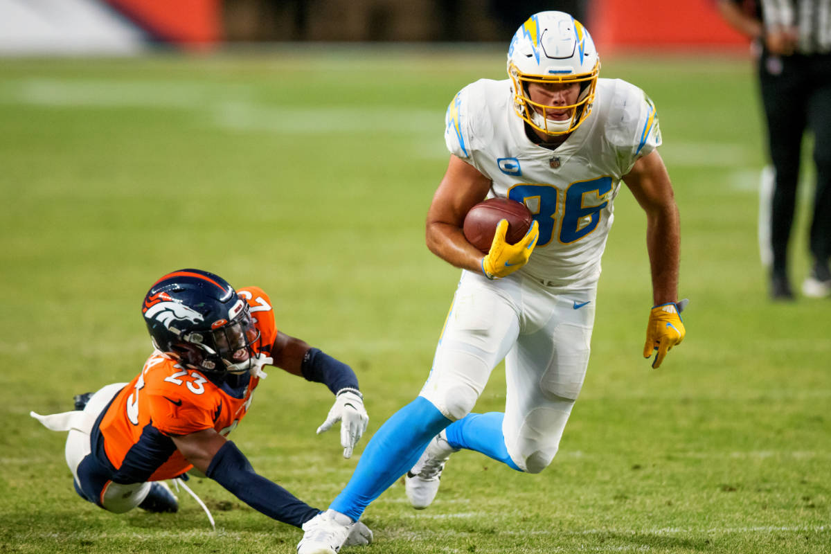 Los Angeles Chargers tight end Hunter Henry (86) runs with the football after catching a pass a ...