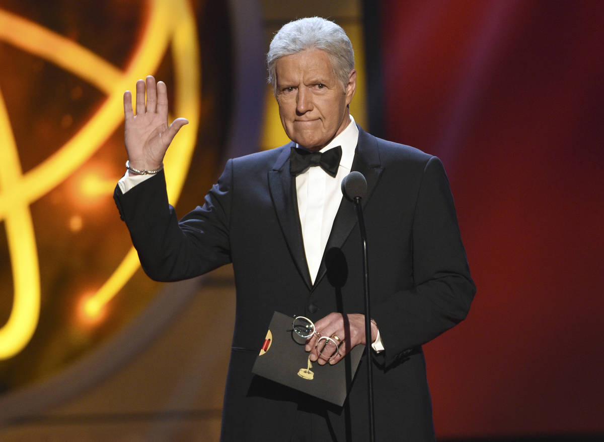 FILE - This May 5, 2019 file photo shows Alex Trebek presenting an award at the 46th annual Day ...