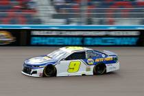 Chase Elliott (9) races through Turn 4 during the NASCAR Cup Series auto race at Phoenix Racewa ...