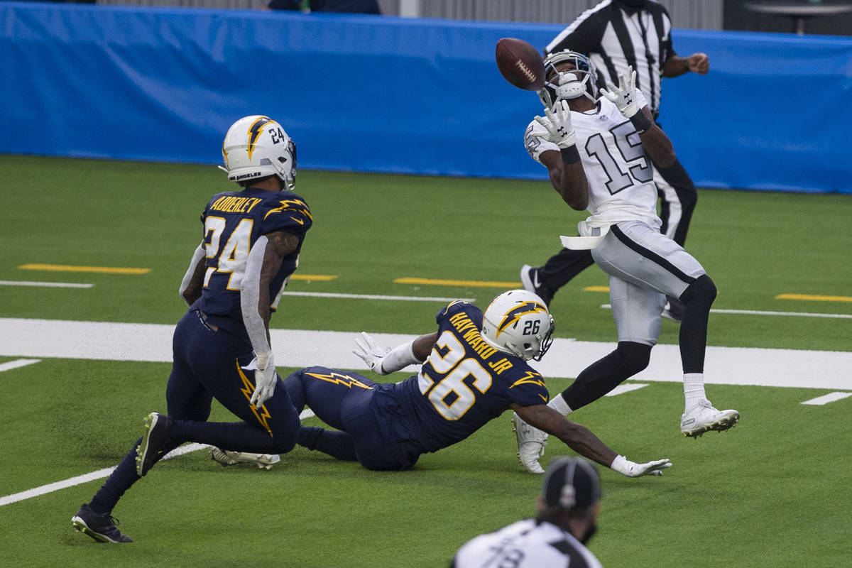 Las Vegas Raiders wide receiver Nelson Agholor (15) prepares to make a catch over Los Angeles C ...