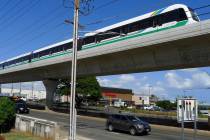 A rail car tops an elevated rail line in Waipahu, Hawaii, in 2017. (AP Photo/Cathy Bussewitz)