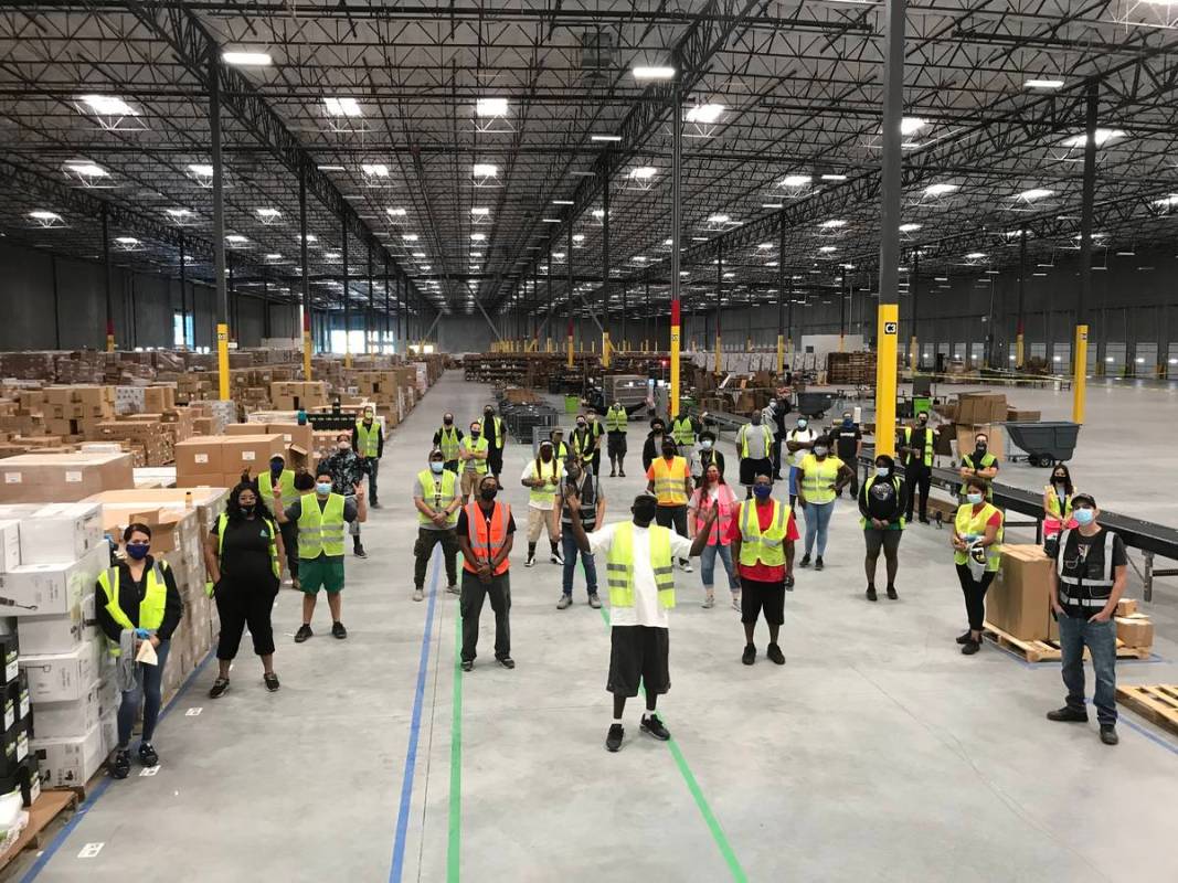 Workers are photographed in Whitebox's newly leased industrial facility in North Las Vegas. (Cu ...