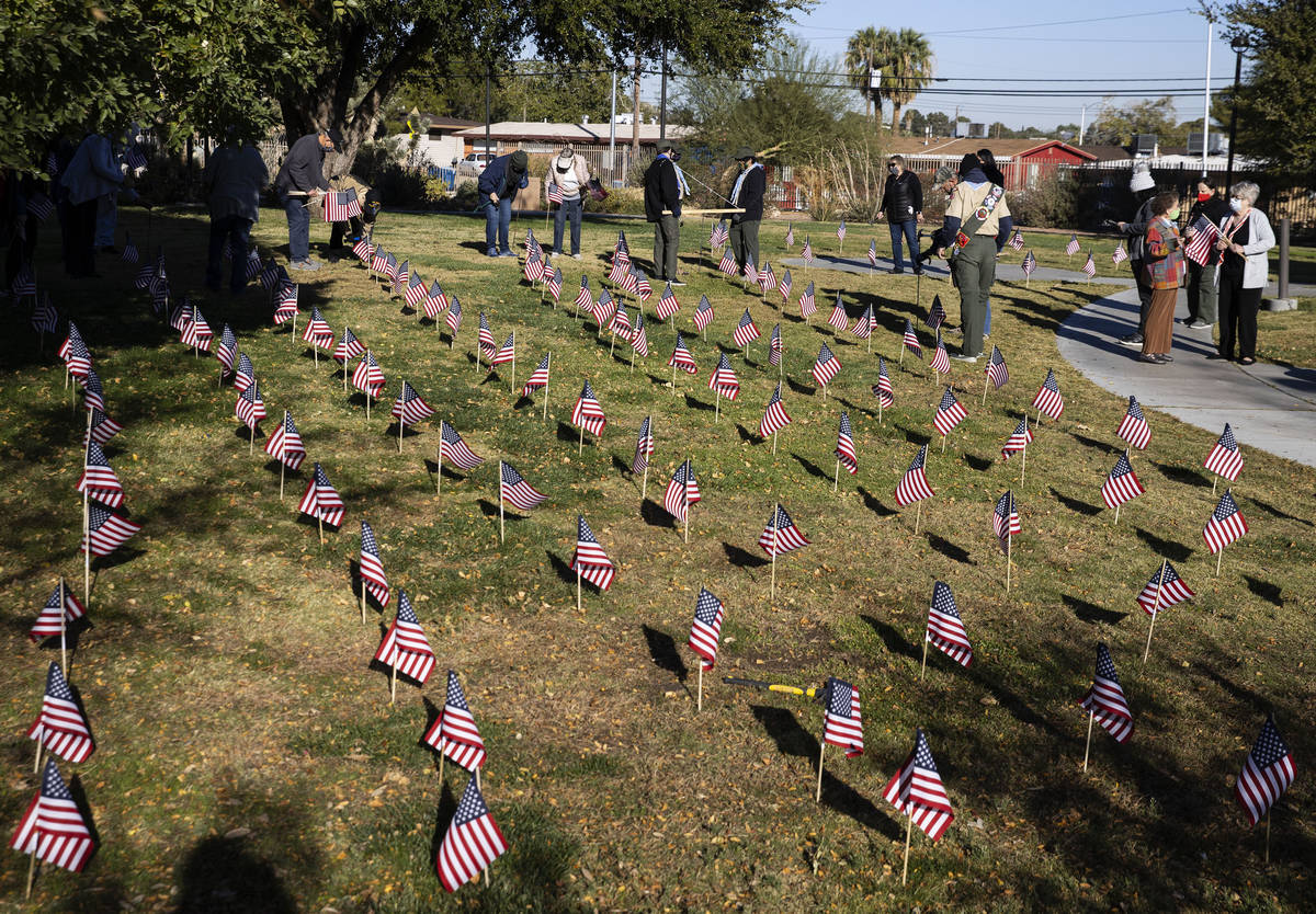 Nevada Garden Club planted 200 flags for Veterans Day at the Garden of the Pioneer Woman at Lor ...