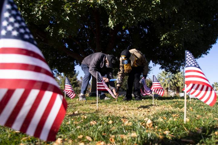 Gordon Woodward, retired U.S. Army corporal, left, and retired U.S. Air Force Lt. Col. Christin ...