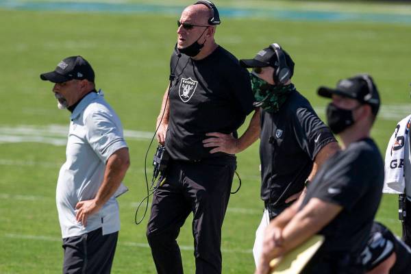 Las Vegas Raiders coaches, from left, Rich Bisaccia, Tom Cable and Rod Marinelli coach from the ...