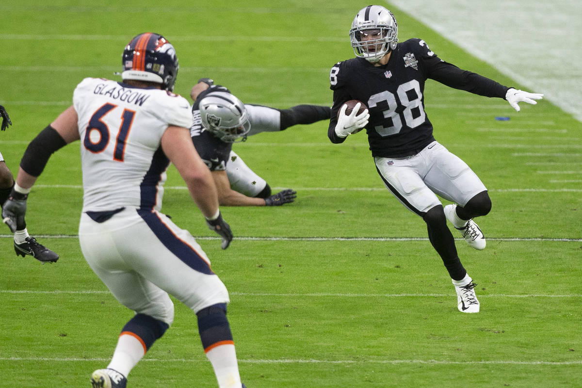 Las Vegas Raiders strong safety Jeff Heath (38) runs after intercepting the football as Denver ...