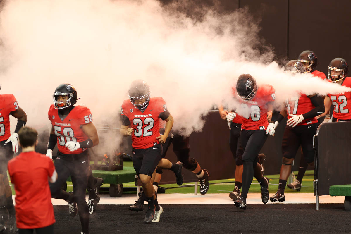 UNLV Rebels take the field for their game against Fresno State Bulldogs during in the NCAA foot ...