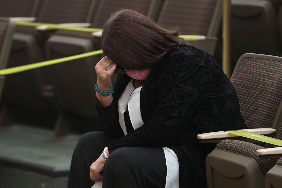 Lisa Baxter lowers her head during the fact finding review in the death of her son David Baxter ...