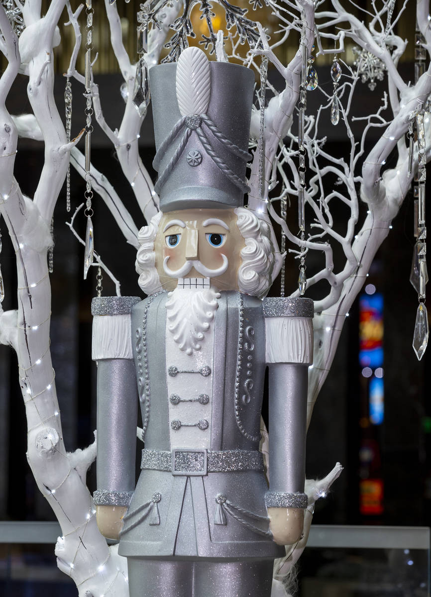 Nutcrackers are apart of the Aria holiday lobby display, which required 4,000 pounds of sugar t ...
