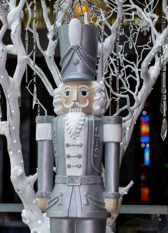Nutcrackers are apart of the Aria holiday lobby display, which required 4,000 pounds of sugar t ...