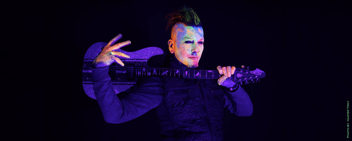 DJ Ashba is shown in a promotional photo for "Hypnotic," featuring Cali Tucker, an EDM track th ...