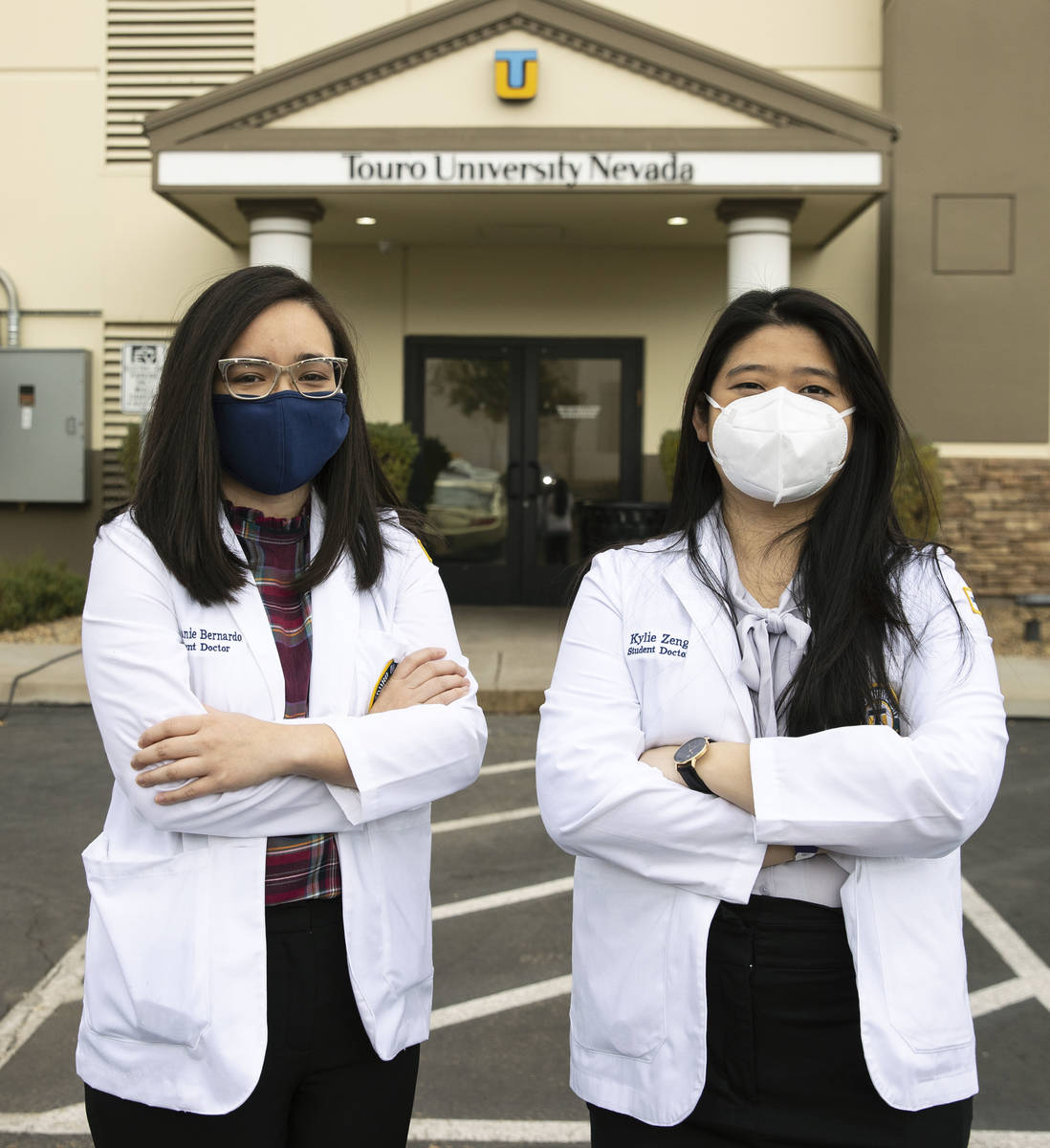 Toro University Nevada students, Stephanie Bernardo, left, and Kylie Zeng pose for a photo, on ...