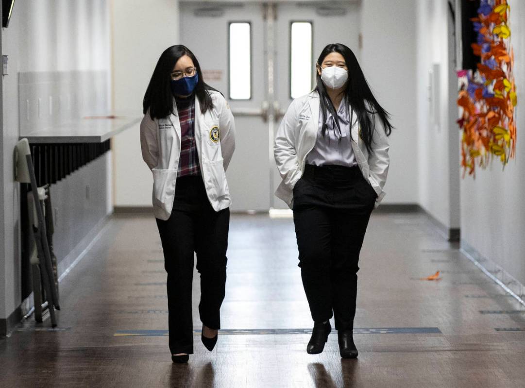 Toro University Nevada students, Stephanie Bernardo, left, and Kylie Zeng walk at their school, ...