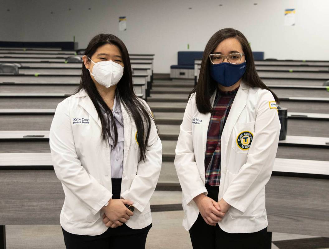 Toro University Nevada students, Kylie Zeng, left, and Stephanie Bernardo, pose for a photo, on ...