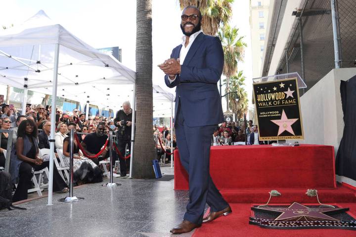 FILE - Filmmaker/actor Tyler Perry, known for the "Madea" films, appears during a ceremony hono ...