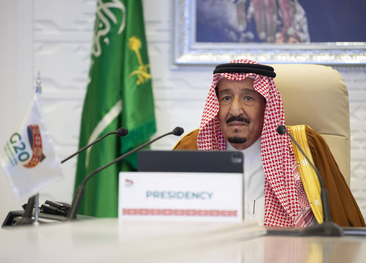 In this handout image provided by Saudi Royal Palace, Saudi King Salman gives his opening remar ...