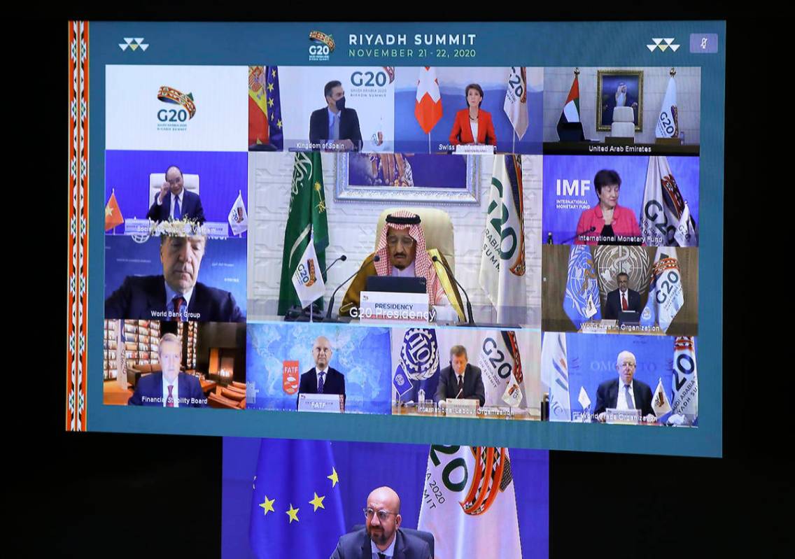 European Council President Charles Michel, on screen bottom, participates in a virtual G20 meet ...