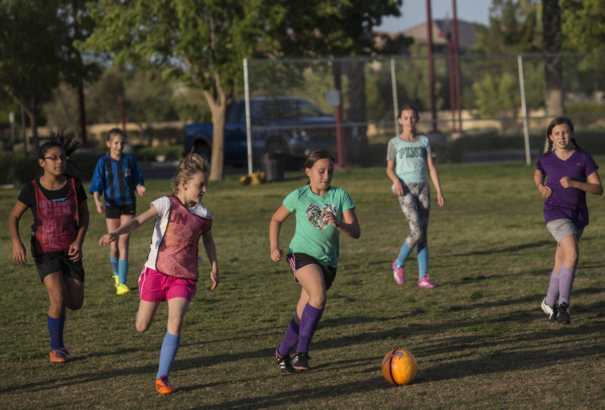The American Youth Soccer Organization (AYSO) region 1258 kids under 12 team practices at Summe ...
