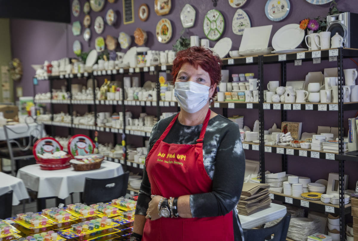 Co-founder of All Fired Up Gail Schomisch is seen in the paint-your-own pottery studio, on Tues ...