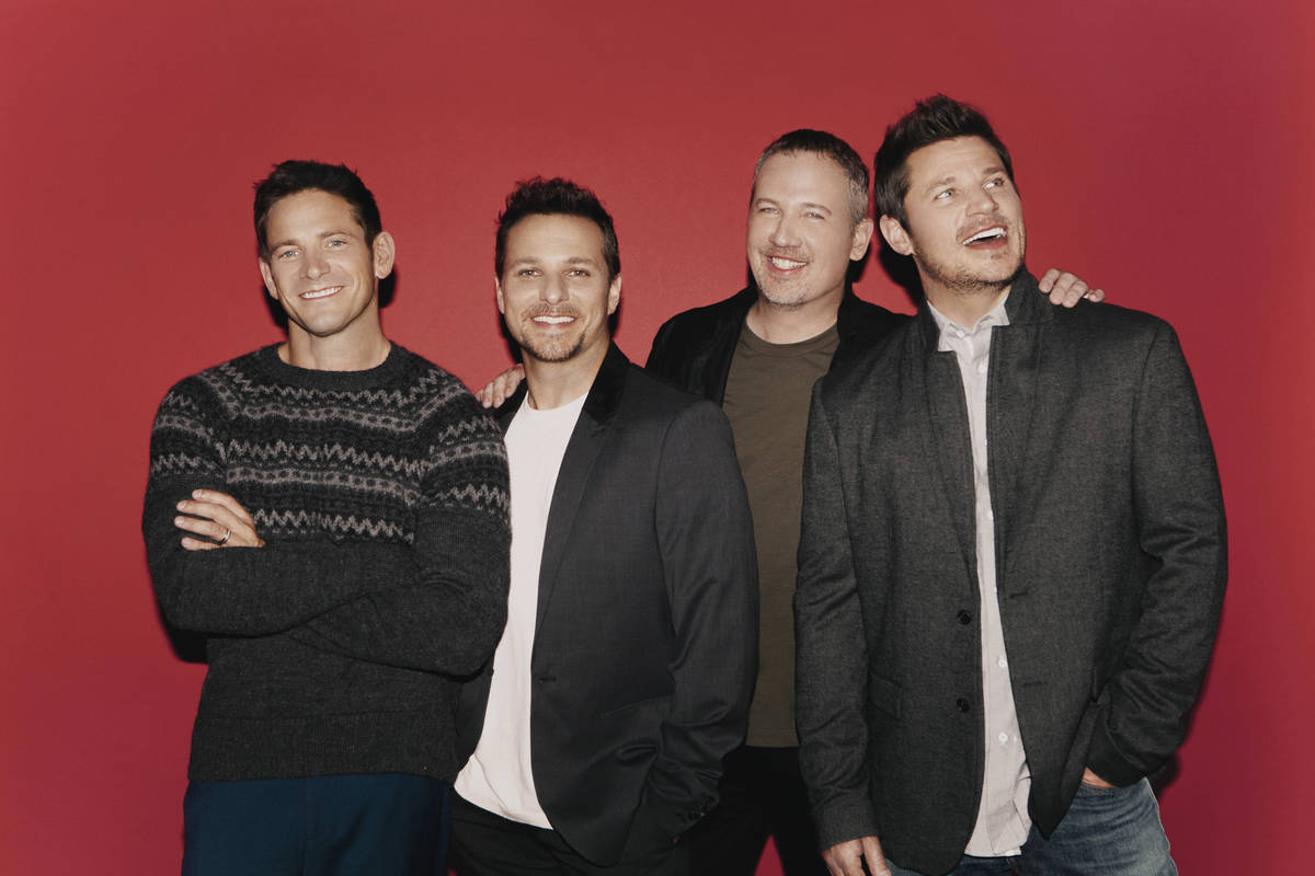 Member of 98 Degrees are shown, from left: Jeff Timmons, Drew Lachey, Justin Jeffre and Nick La ...
