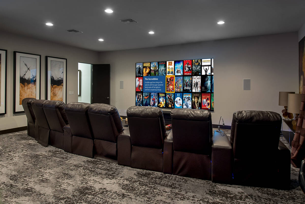 A large movie theater is on the main floor of the 7,000-square-foot main house. The home is in ...