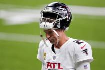 FILE- In this Sunday, Nov. 22, 2020, file photo, Atlanta Falcons quarterback Matt Ryan (2) walk ...