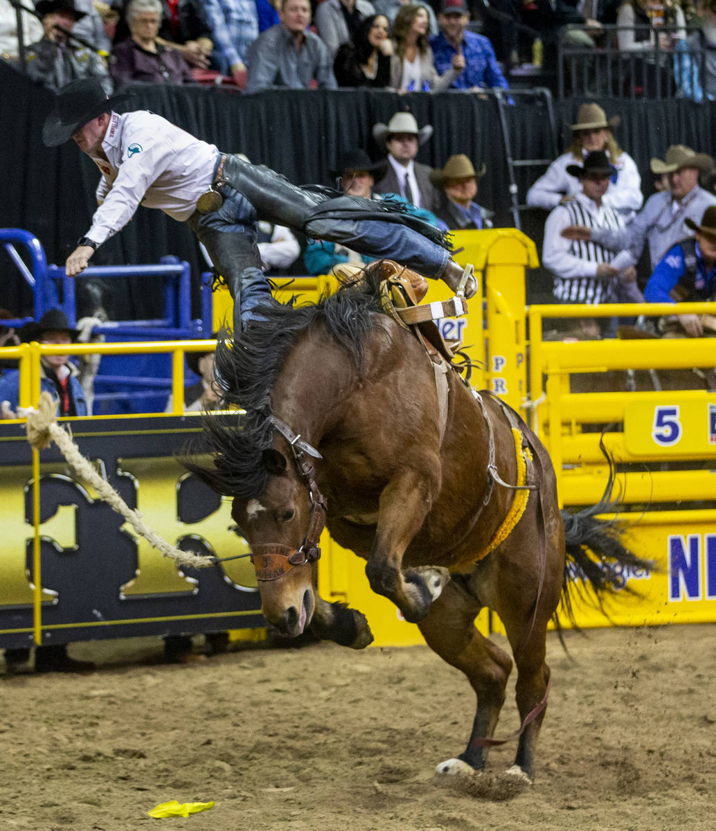 Sterling Crawley of Stephenville, Texas, gets tossed off in Saddle Bronc Riding at the tenth go ...