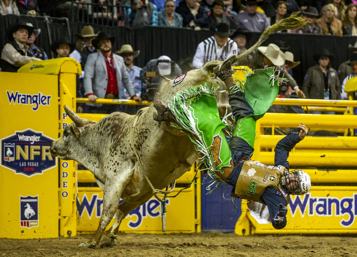 Jordan Spears of Redding, Calif., is tossed off the back in Bull Riding at the tenth go round o ...