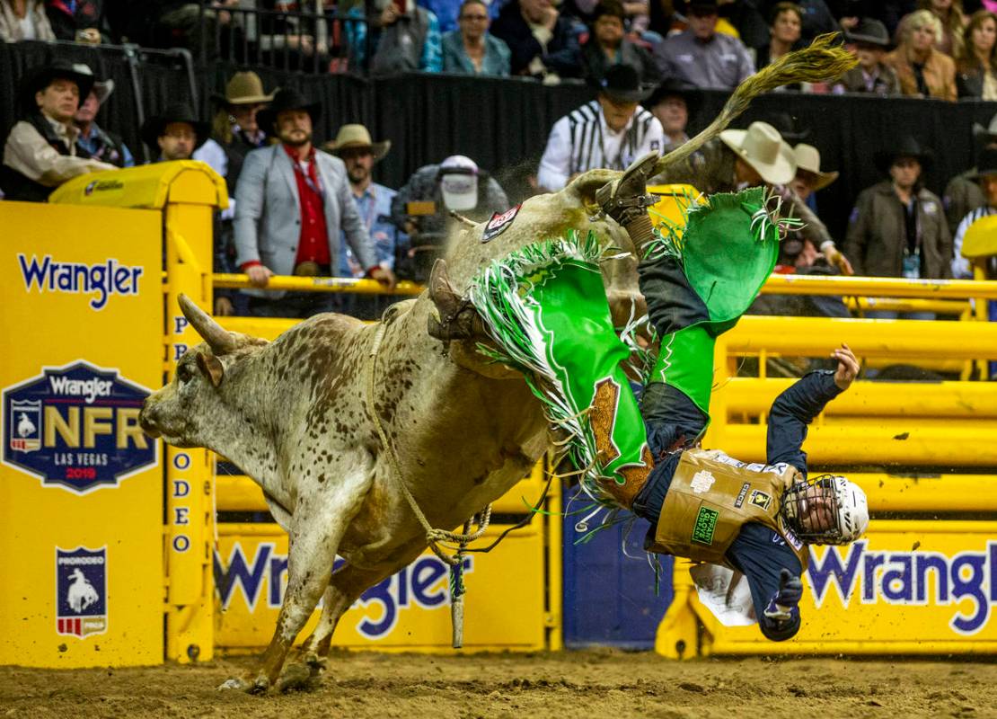 Jordan Spears of Redding, Calif., is tossed off the back in Bull Riding at the tenth go round o ...