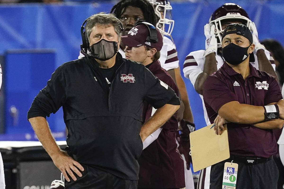 In this Saturday, Oct. 10, 2020, file photo, Mississippi State coach Mike Leach stands on the s ...