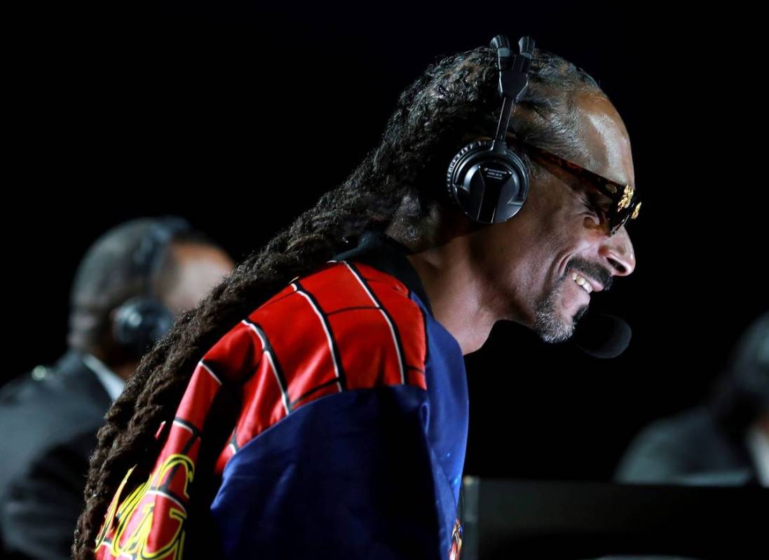 Snoop Dogg performs onstage at an exhibition boxing bout between Mike Tyson and Roy Jones Jr. o ...