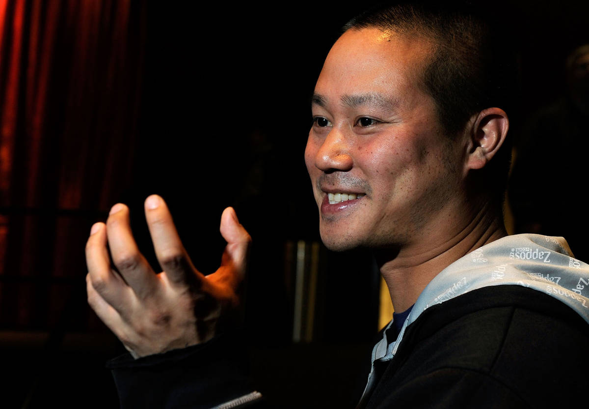 Zappos CEO Tony Hsieh gestures during an interview before the srtart of the LaunchUp Las Vegas ...