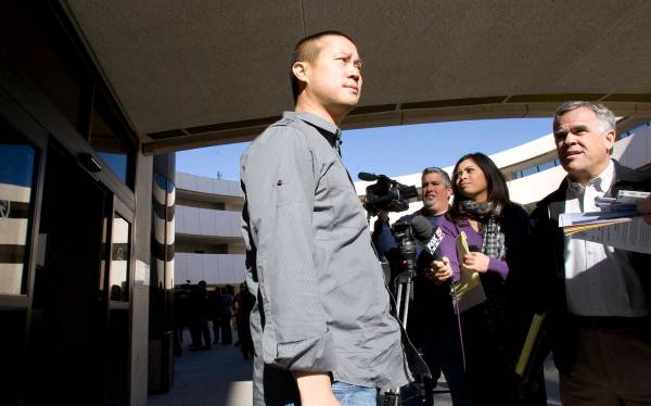 Tony Hsieh, CEO of Zappos a subsidiary of Amazon.com, takes questions as he leaves Las Vegas Ci ...